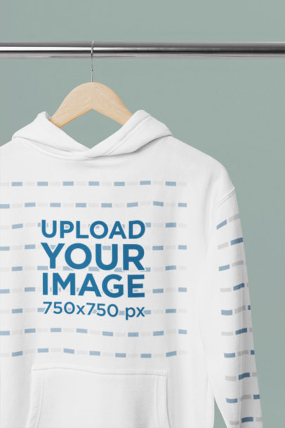 Mockup of a Cotton Heritage Hoodie Placed on a Wooden Hanger