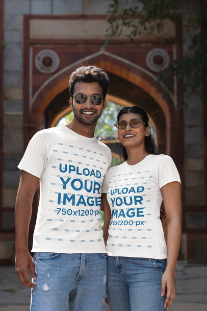 Gildan Tee Mockup Featuring Two Travelers Smiling at the Camera