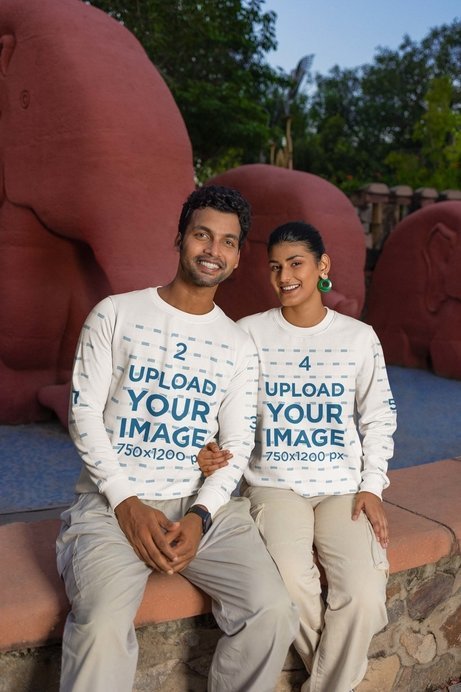 Mockup of a Man and a Woman Wearing Crewneck Sweatshirts Together