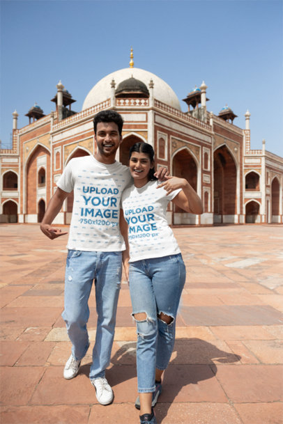 Gildan Round-Neck T-Shirt Mockup of a Cheerful Couple in a Touristic Place