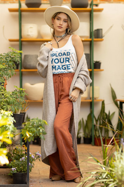 Bella Canvas Tank Top Mockup of a Boho-Styled Woman Posing Near Some Plants