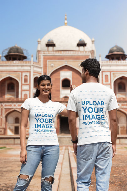 Gildan Matching T-Shirt Mockup of a Happy Couple Posing in a Historical Monument