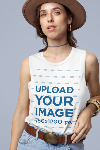 Bella Canvas Tank Top Mockup Featuring a Woman Posing in a Studio with a Boho Outfit