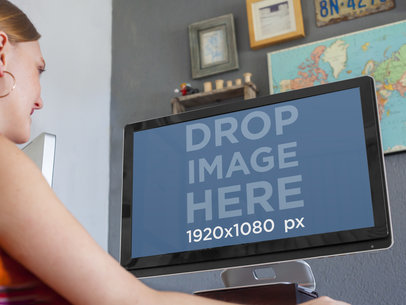 Desktop PC Mockup of a Woman Planning a Trip