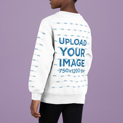 Back-View Crewneck Sweatshirt Mockup Featuring a Boy Standing Against a Colorful Backdrop
