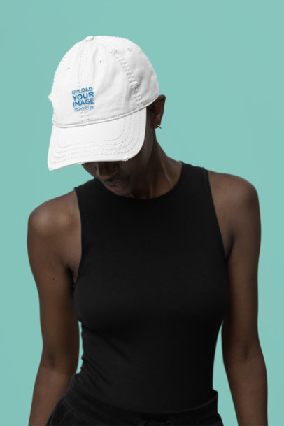 Otto Cap Dad Hat Mockup Featuring a Woman Posing in a Studio