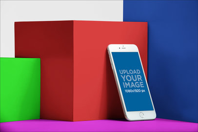 Silver iPhone 8 Mockup Leaning Against Cubes