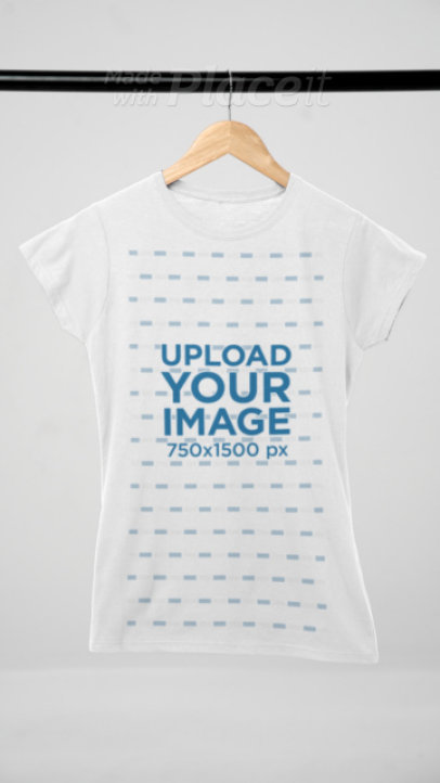 Video of a Gildan Round-Neck T-Shirt Placed on a Wooden Hanger