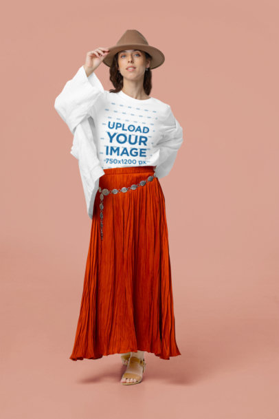 Bella Canvas Tee Mockup of a Woman Wearing a Boho-Style Outfit in a Studio