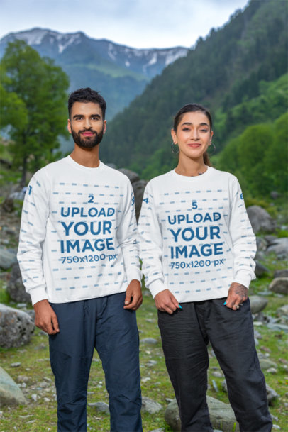 Sweatshirt Mockup of a Smiling Man and Woman Standing Near the Mountains m35584