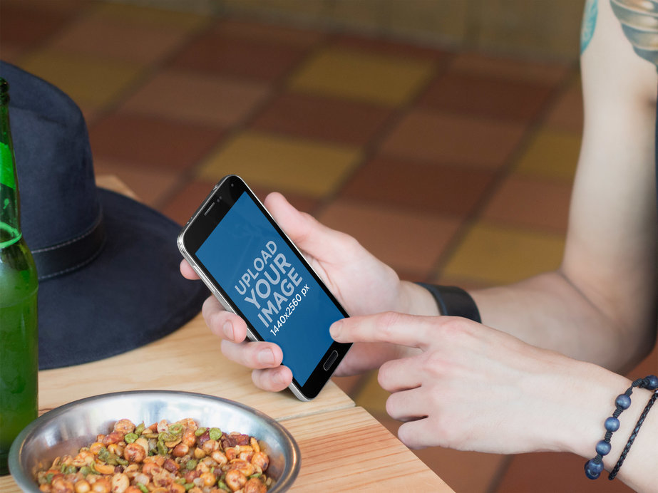 Placeit - Android Mockup of Rocker Guy Checking His Samsung Galaxy