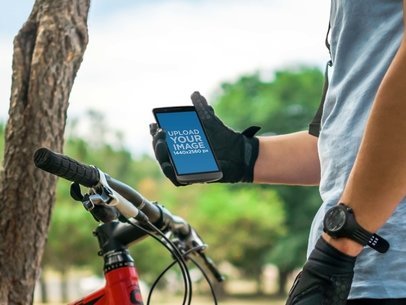 Cyclist Using LG G3 at the Park Android Mock-Up Template