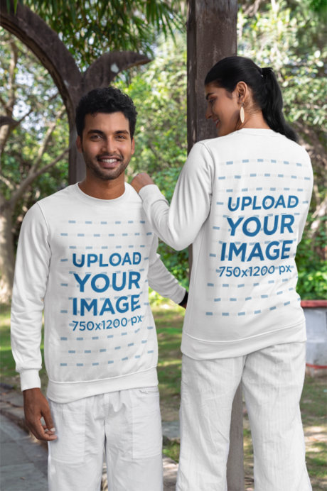 Sweatshirt Mockup of a Smiling Couple Standing in a Park