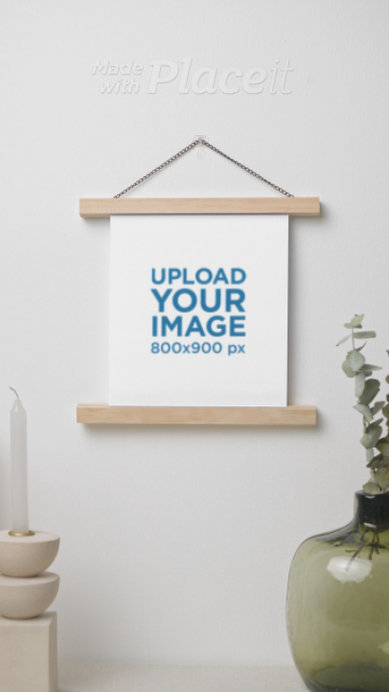 Video of a Matte Vertical Poster Hanging on a White Wall