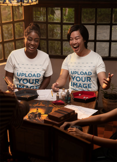 T-Shirt Mockup Featuring a Man and a Woman Happily Playing Board Games at Home