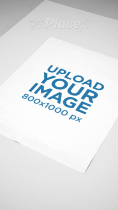 Video of a Matter Vertical Poster Lying on a Colorful Surface