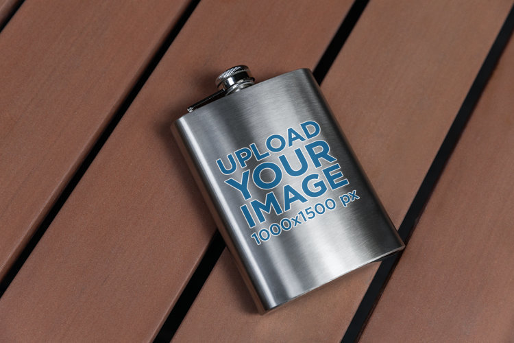 Mockup of a Hip Flask Placed over a Wooden Surface