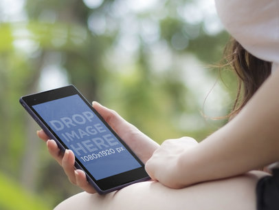 Mockup Template of Woman Using Sony Xperia Outdoors