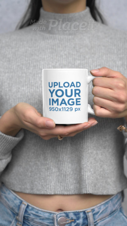 Video of a Woman Showcasing an 11 oz Coffee Mug 7610v