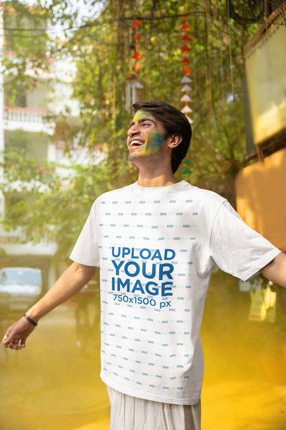 Blinkstore T-Shirt Mockup of an Excited Man Celebrating Holi