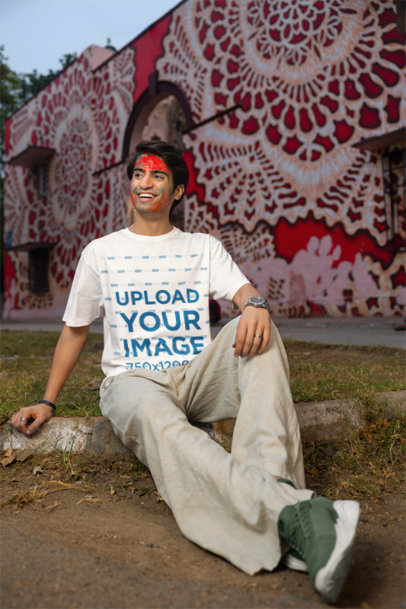 Crewneck Blinkstore Tee Mockup of a Smiling Man Celebrating the Holi Festival