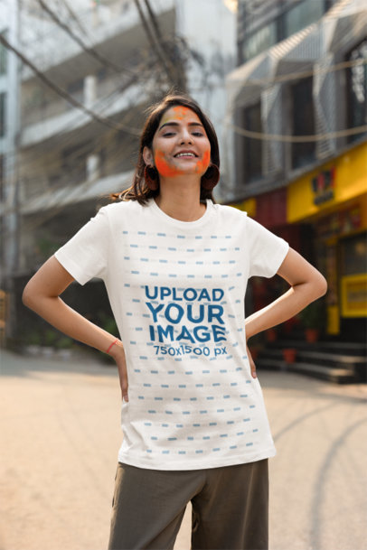 Scott International T-Shirt Mockup of a Woman Celebrating the Holi Festival on the Street