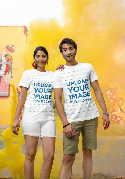 Mockup of a Man and a Woman Wearing Matching T-Shirts for the Holi Festival
