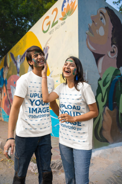 Scott International T-Shirt Mockup of a Happy Couple Having Fun in a Holi Fest m37226