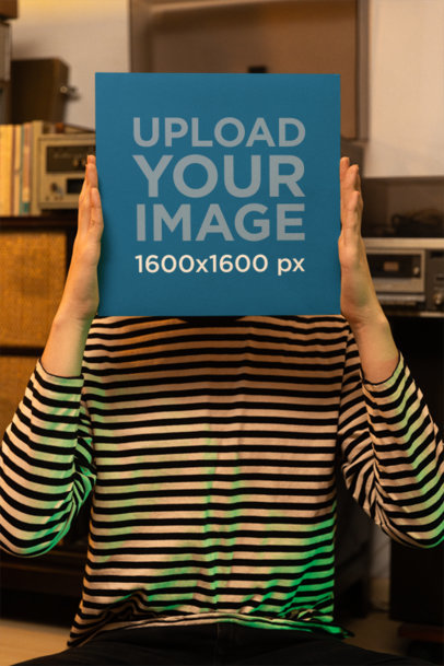 Mockup of a Musician Man Covering His Face With a Vinyl Album m37036