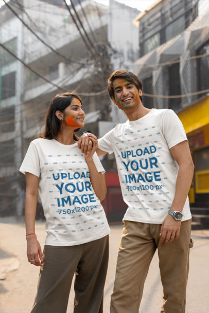Scott International T-Shirt Mockup of a Smiling Woman Celebrating Holi With a Man