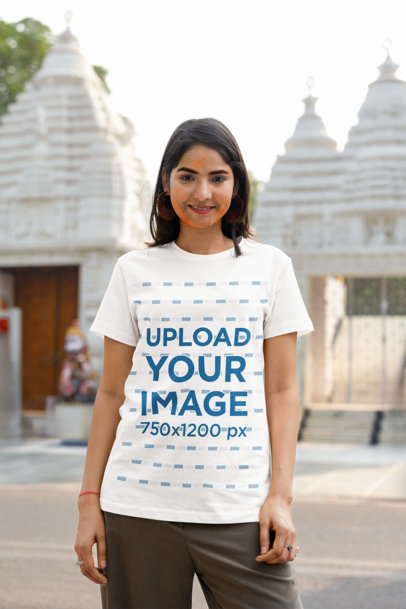 Scott International Tee Mockup of a Woman Celebrating the Holi Festival on the Street