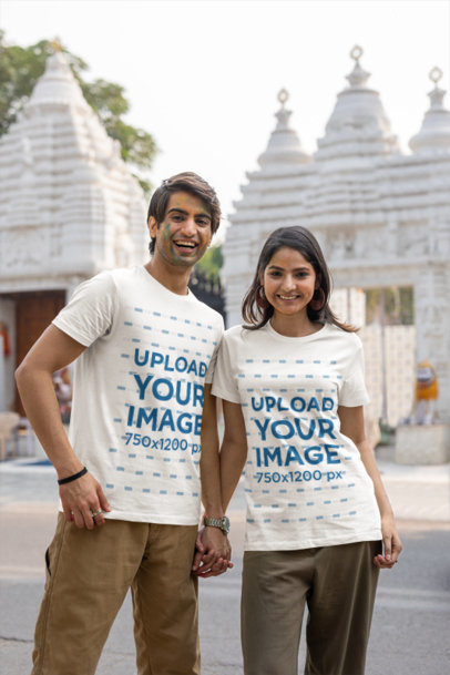 Scott International T-Shirt Mockup Featuring a Man and Woman Smiling in Holi Festival
