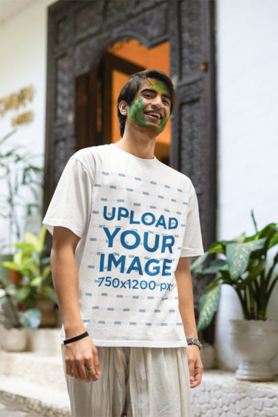 Blinkstore T-Shirt Mockup of a Man Getting Ready for the Holi Festival