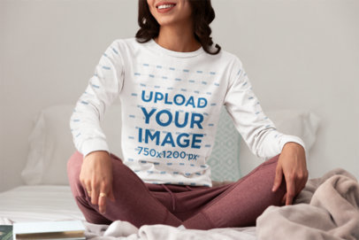 Bella Canvas Long-Sleeve Tee Mockup Featuring a Cropped-Face Woman Sitting in a Bed