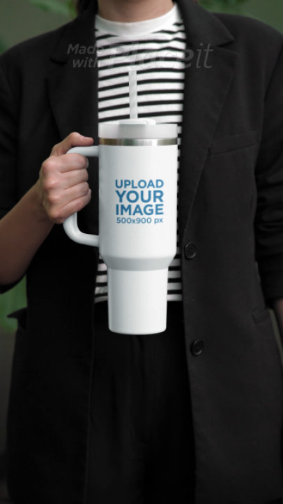 Video of a Woman Holding a Stanley Tumbler 7614v