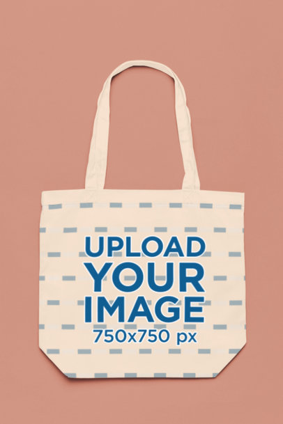 Mockup of an Econscious Tote Bag Flat Laid over a Customizable Surface