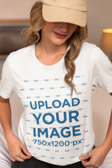 Placeit Bella Canvas T Shirt Mockup of a Female Influencer at Home
