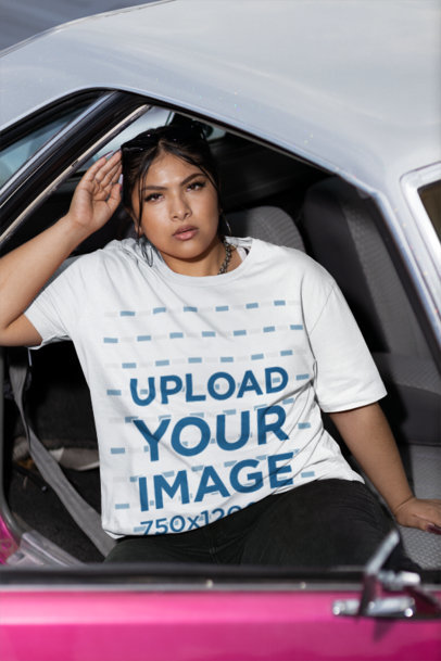 Mockup of a Woman Wearing a Stanley Stella T-Shirt Inside of a Car
