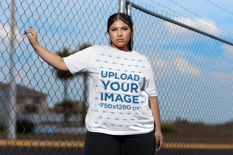 Stanley Stella T-Shirt Mockup Featuring a Woman Powerfully Looking into the Camera