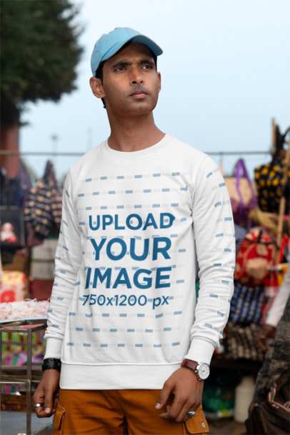 Mockup Featuring a Man Wearing a Round-Neck Sweatshirt at a Street Market