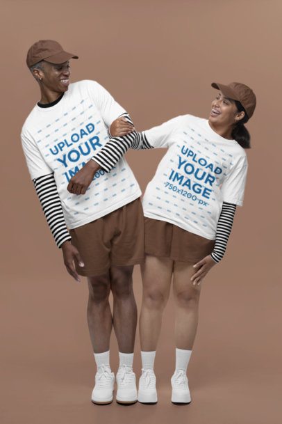 Bella Canvas Tee Mockup of a Fun Couple Wearing Matching Gender-Neutral Outfits