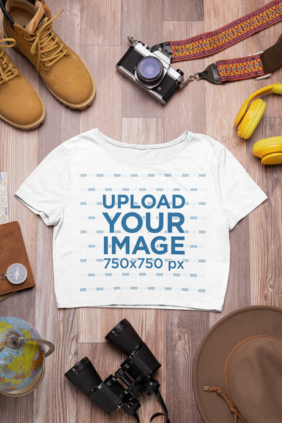 Outfit Mockup of a Bella Canvas Crop Top Placed over a Wooden Surface m37443