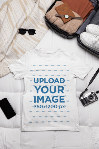 Outfit Mockup of a Bella Canvas T-Shirt Placed on a Bed Next to a Vintage Camera  m37445