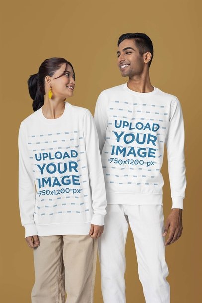 Crewneck Sweatshirt Mockup of a Happy Man and Woman Posing in a Studio for an E-Shop Catalog