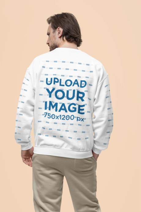Back-View Gildan Sweatshirt Mockup Featuring a Man Standing in a Studio