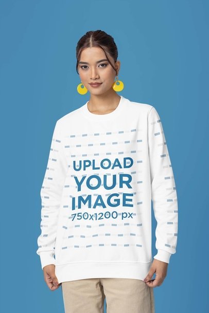 Mockup of a Woman Wearing a Sweatshirt with a Round Neck in a Studio