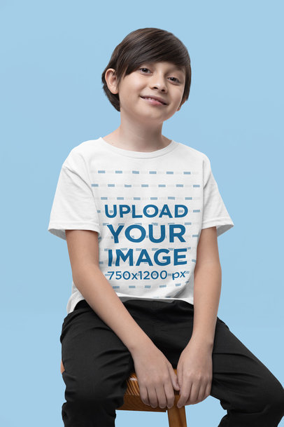Gildan T-Shirt Mockup of a Smiling Boy Sitting on a Stool  m37683