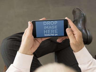 Elderly Man With iPhone 6 Plus Stock Photo