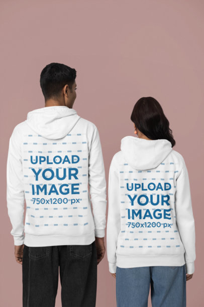 Back-View Gildan Hoodie Mockup of a Man and Woman Posing in a Studio for an E-Shop Catalog