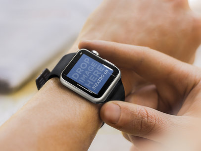 Young Man Wearing Black Apple Watch on Left Hand